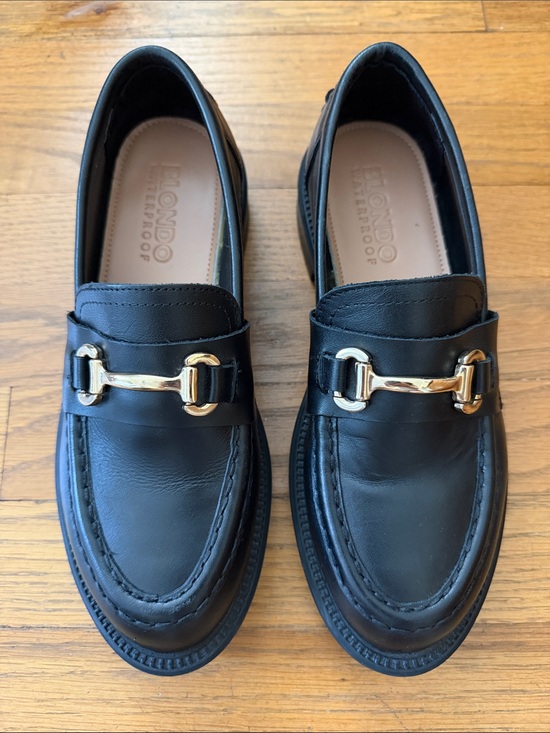 Blondo Shoes - Blondo waterproof Hollee black leather loafers with gold tone details. Size 7